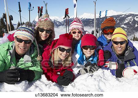 Two Family Having Fun On Ski Holiday In Mountains View Large Photo Image Picture - Two Family Having Fun On Ski Holiday In Mountains. Fotosearch