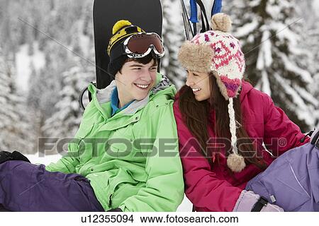 Two Teenagers On Ski Holiday In Mountains View Large Photo Image Picture - Two Teenagers On Ski Holiday In Mountains. Fotosearch