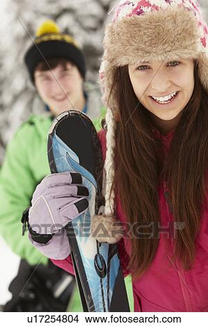 Two Teenagers On Ski Holiday In Mountains View Large Photo Image Picture - Two Teenagers On Ski Holiday In Mountains. Fotosearch