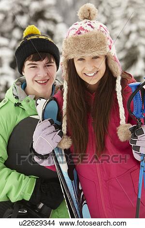Two Teenagers On Ski Holiday In Mountains View Large Photo Image Picture - Two Teenagers On Ski Holiday In Mountains. Fotosearch