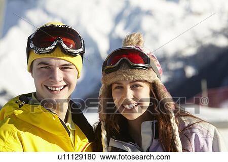 Two Teenagers On Ski Holiday In Mountains View Large Photo Image Stock Image - Two Teenagers On Ski Holiday In Mountains. Fotosearch