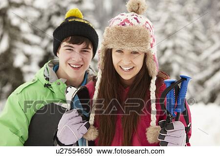 Two Teenagers On Ski Holiday In Mountains View Large Photo Image Stock Image - Two Teenagers On Ski Holiday In Mountains. Fotosearch