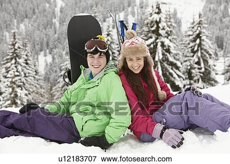 Two Teenagers On Ski Holiday In Mountains View Large Photo Image Stock Photo - Two Teenagers On Ski Holiday In Mountains. Fotosearch