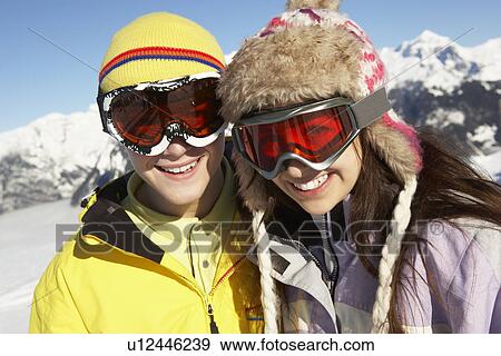 Two Teenagers On Ski Holiday In Mountains View Large Photo Image Stock Photo - Two Teenagers On Ski Holiday In Mountains. Fotosearch