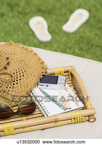 Bamboo tray with digital camera and notebook View Large Photo Image Stock Image - Bamboo tray with digital camera and notebook. Fotosearch