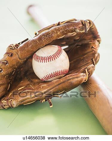 Baseball glove with ball and bat View Large Photo Image Stock Photo - Baseball glove with ball and bat. Fotosearch