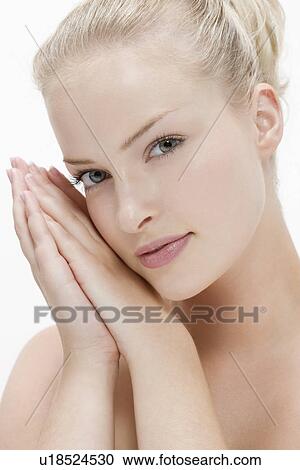 Beauty portrait of woman with hands clasped View Large Photo Image Stock Image - Beauty portrait of woman with hands clasped. Fotosearch