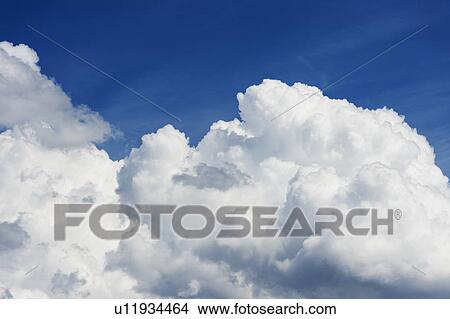 Blue sky with clouds View Large Photo Image Picture - Blue sky with clouds. Fotosearch