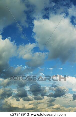 Stock Image - Blue sky with clouds. Fotosearch