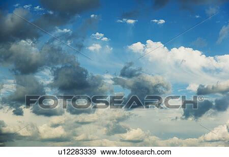 Blue sky with clouds View Large Photo Image Stock Photo - Blue sky with clouds. Fotosearch