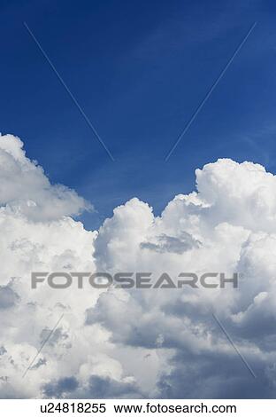 Blue sky with clouds View Large Photo Image Stock Photography - Blue sky with clouds. Fotosearch