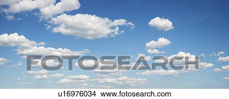 Blue sky with white clouds View Large Photo Image Picture - Blue sky with white clouds. Fotosearch