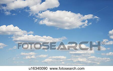 Stock Image - Blue sky with white clouds. Fotosearch