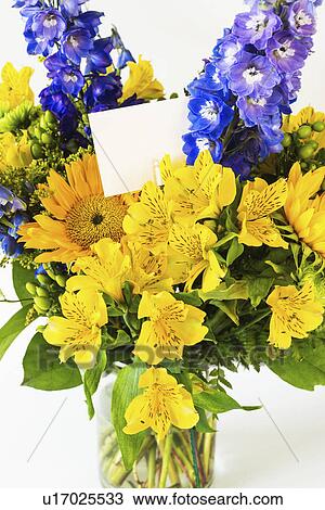 Bunch of colorful flowers in vase with note attached to it View Large Photo Image Stock Image - Bunch of colorful flowers in vase with note attached to it. Fotosearch