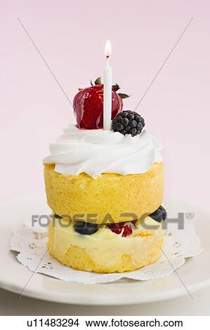 Picture - Cake with berries and whipped cream. Fotosearch
