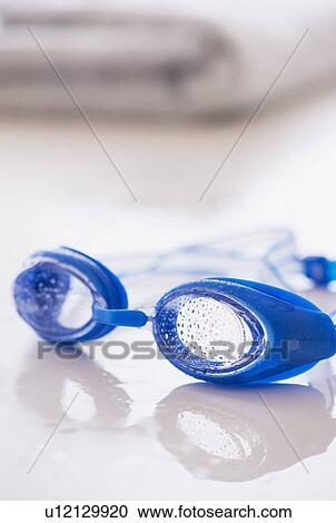 Close-up of blue swimming goggles View Large Photo Image Stock Image - Close-up of blue swimming goggles. Fotosearch