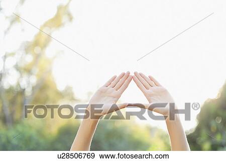 Stock Photo - Close-up of conjoined female hands. Fotosearch
