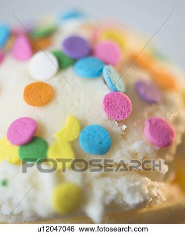 Stock Photograph - Close-up of sprinkles on ice cream. Fotosearch