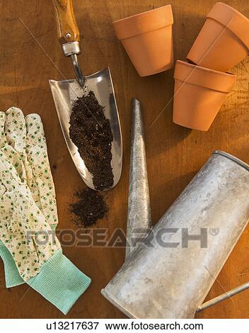 Stock Photo - Collection of gardening utensils. Fotosearch