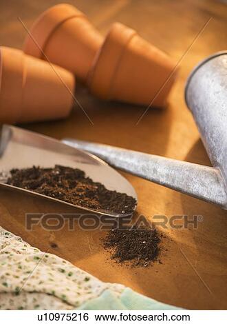 Stock Photograph - Collection of gardening utensils. Fotosearch