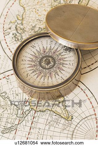 Compass and antique map View Large Photo Image Picture - Compass and antique map. Fotosearch