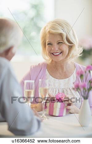 Couple in restaurant View Large Photo Image Stock Image - Couple in restaurant. Fotosearch