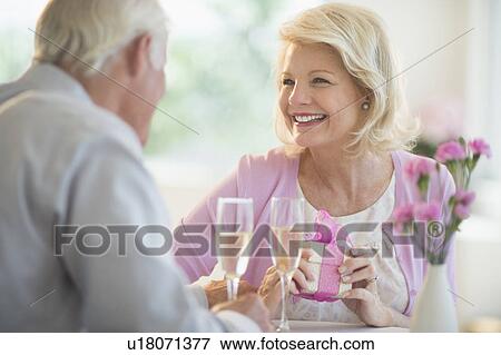 Couple in restaurant View Large Photo Image Stock Photo - Couple in restaurant. Fotosearch