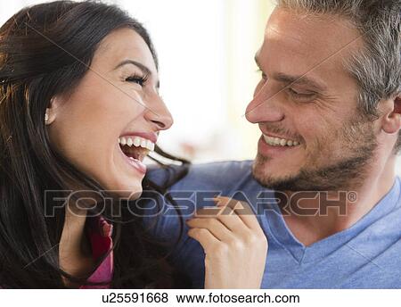 Stock Photo - Couple laughing. Fotosearch