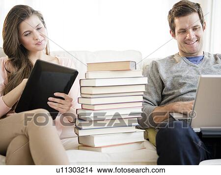 Picture - Couple studying together. Fotosearch