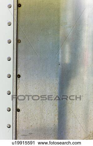 Detail of metal with rivets View Large Photo Image Stock Image - Detail of metal with rivets. Fotosearch