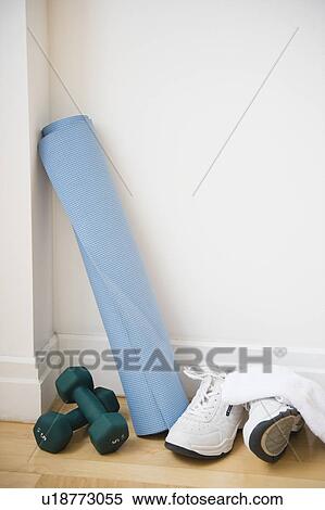 Stock Photography - Exercising equipment at home. Fotosearch