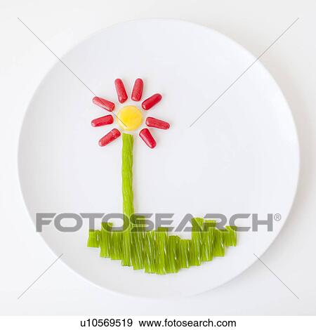 Stock Photo - Flower on plate made out of jelly beans. Fotosearch