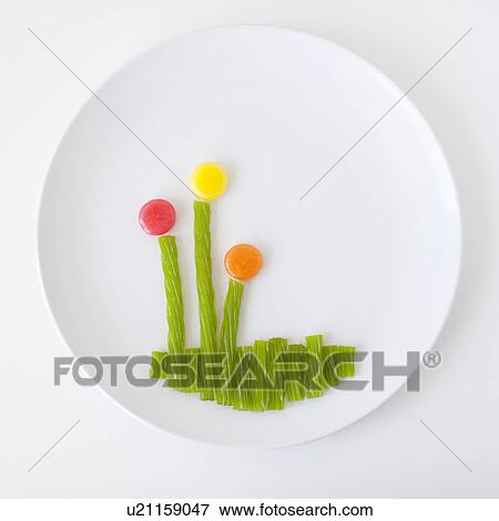 Flower on plate made out of jelly beans View Large Photo Image Stock Photo - Flower on plate made out of jelly beans. Fotosearch