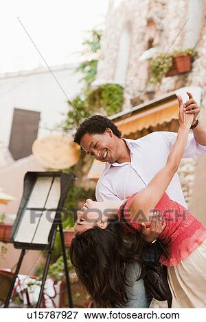 France, Cassis, Couple dancing on street View Large Photo Image Stock Photo - France, Cassis, Couple dancing on street. Fotosearch