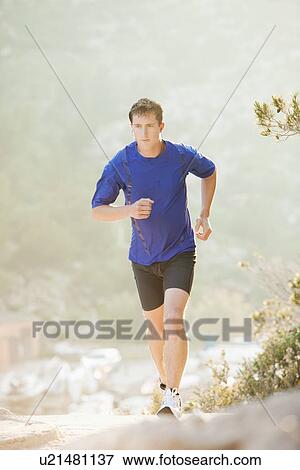 France, Marseille, Man jogging on sunny day View Large Photo Image Stock Photo - France, Marseille, Man jogging on sunny day. Fotosearch