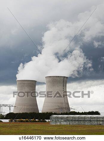 Stock Image - France, Rocroi, Cooling towers of nuclear power plant. Fotosearch