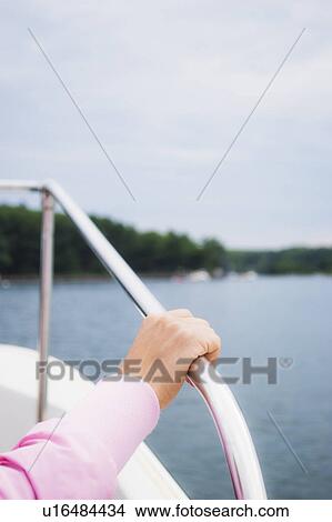 Hand holding yacht railing View Large Photo Image Picture - Hand holding yacht railing. Fotosearch