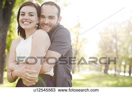 Happy young couple together View Large Photo Image Stock Image - Happy young couple together. Fotosearch