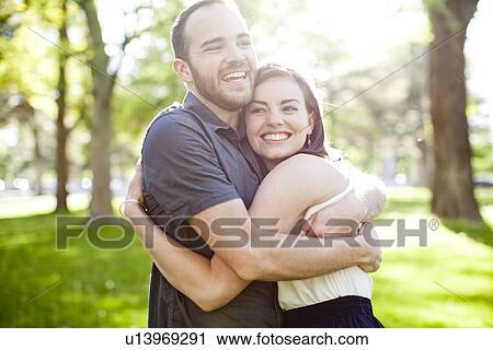 Stock Image - Happy young couple together. Fotosearch