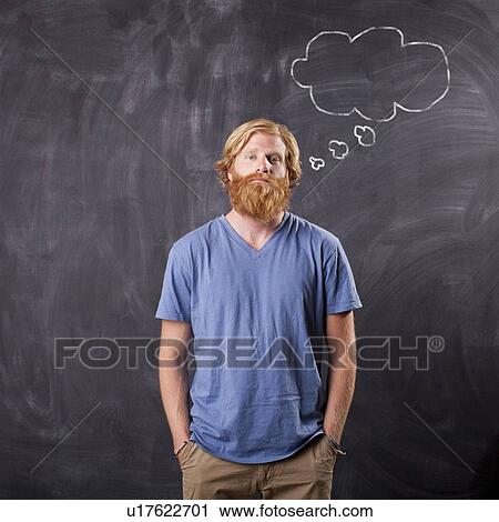 Man in front of blackboard with drawing depicting speech bubble View Large Photo Image Stock Image - Man in front of blackboard with drawing depicting speech bubble. Fotosearch