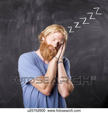 Man sleeping while standing in front of blackboard View Large Photo Image Stock Image - Man sleeping while standing in front of blackboard. Fotosearch