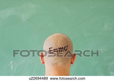 Stock Photo - Man with formula on head in front of blackboard. Fotosearch