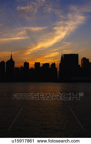 Manhattan skyline after sunset View Large Photo Image Stock Image - Manhattan skyline after sunset. Fotosearch