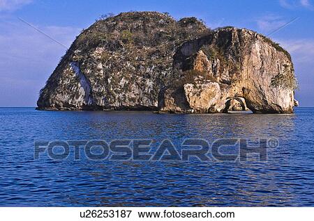 Mexico, Jalisco, Puerto Vallarta, View of rock at Banderas Bay View Large Photo Image Stock Photo - Mexico, Jalisco, Puerto Vallarta, View of rock at Banderas Bay. Fotosearch