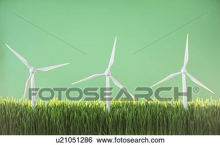 Model wind turbines in grass on green background View Large Photo Image Stock Photograph - Model wind turbines in grass on green background. Fotosearch