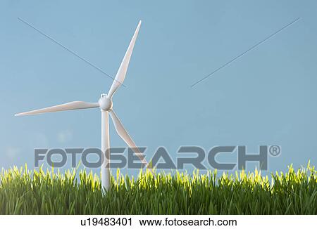 Stock Image - Model wind turbines in grass. Fotosearch