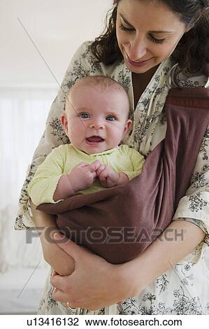 Mother and baby boy (2-5 months) posing together View Large Photo Image Stock Image - Mother and baby boy (2-5 months) posing together. Fotosearch
