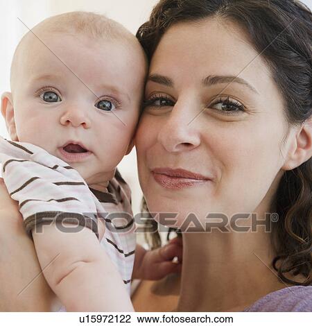 Mother and baby boy (2-5 months) posing together View Large Photo Image Stock Image - Mother and baby boy (2-5 months) posing together. Fotosearch