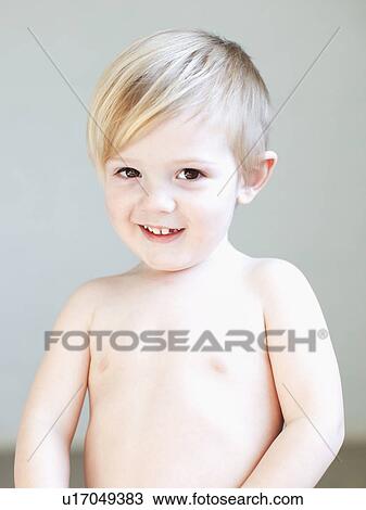 Portrait of boy (2-3) smiling, studio shot View Large Photo Image Stock Image - Portrait of boy (2-3) smiling, studio shot. Fotosearch