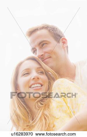 Portrait of couple in sunlight View Large Photo Image Stock Image - Portrait of couple in sunlight. Fotosearch
